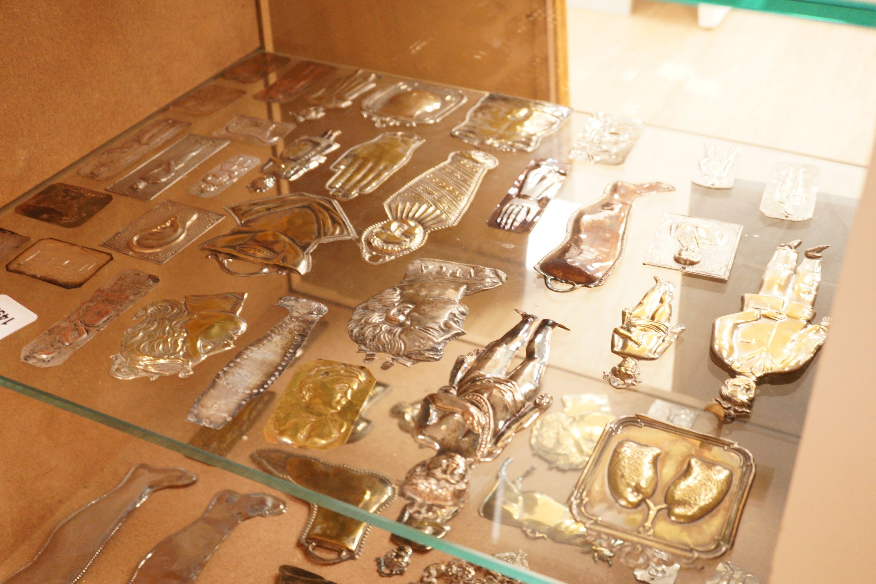 A large collection of Greek / Italian metal appliques